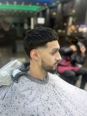 High taper - Textured top - beard with razor sculpting